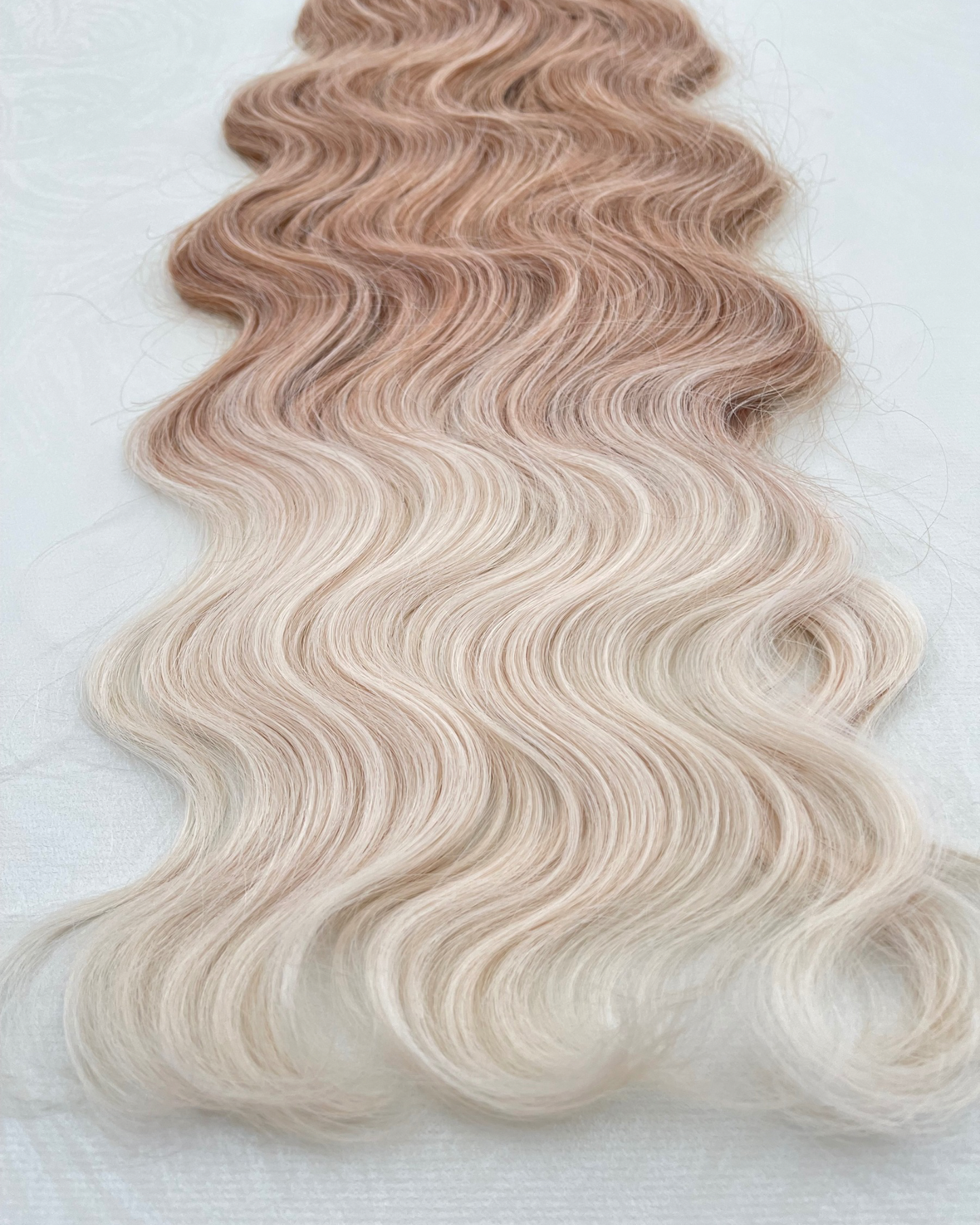 26” 210g Tape-In Weft Bio-Protein Fibre Wavy Highlighted Blonde