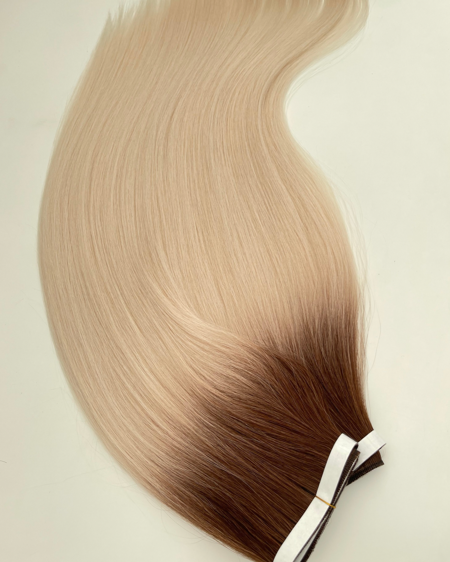 26” 210g Tape-In Weft Bio-Protein Fibre Rooted Beige Blonde